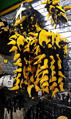Wall of gold fan towels hanging in the shop